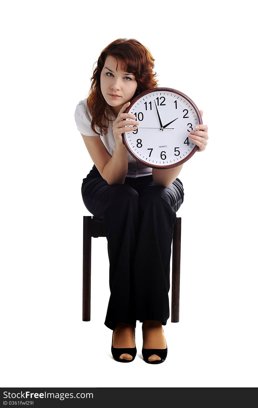 A portrait of a beautiful woman with a big clock. A portrait of a beautiful woman with a big clock