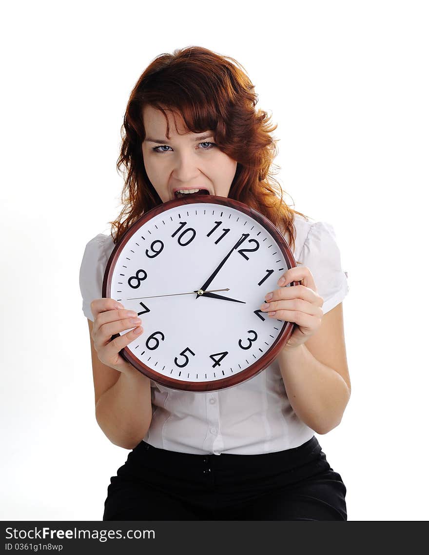 An image of a woman biting a big clock. An image of a woman biting a big clock