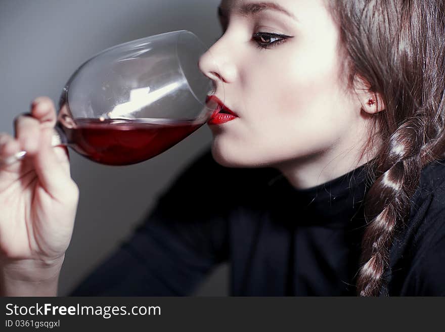 Young Beautiful Girl Testing  Red Wine