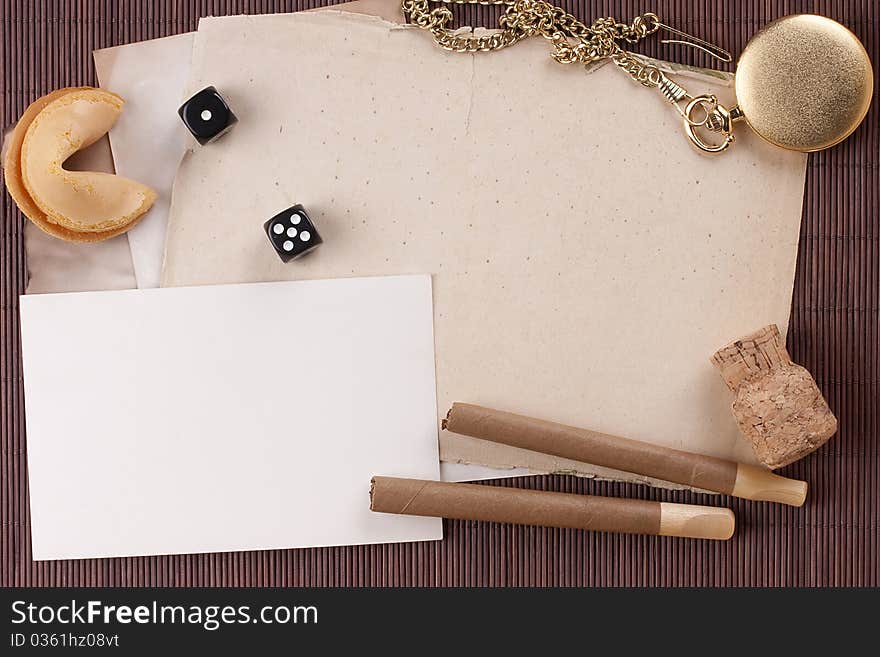 Old tattered sheets of paper on brown wood background for design creativity.