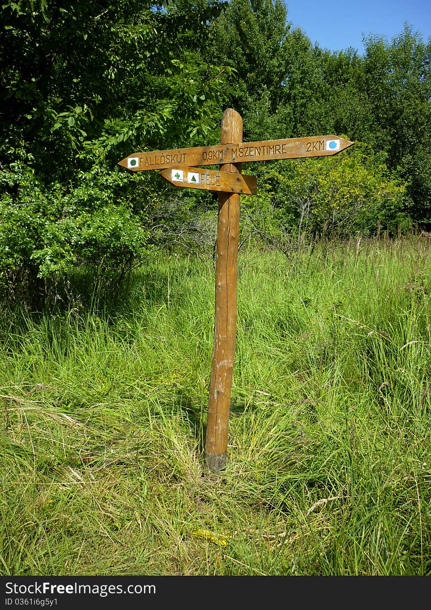 Crossroad wooden directional arrow signs