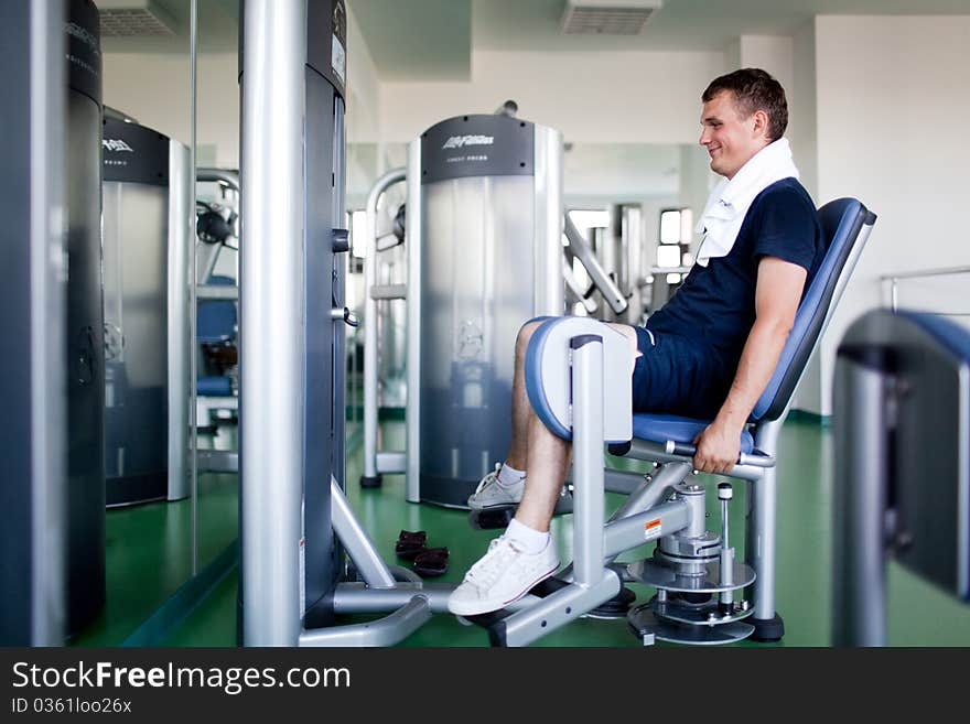 Healthy young man in a sport center. Healthy young man in a sport center