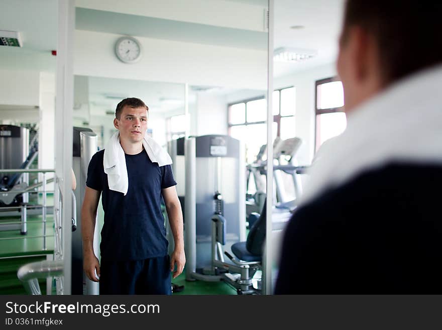 Healthy young man in a sport center. Healthy young man in a sport center