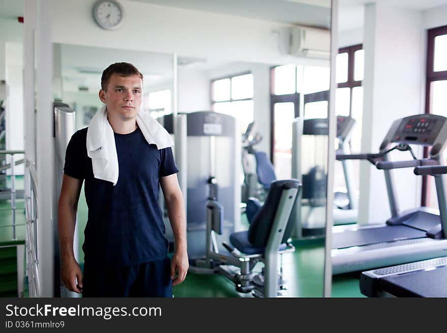 Healthy young man in a sport center. Healthy young man in a sport center