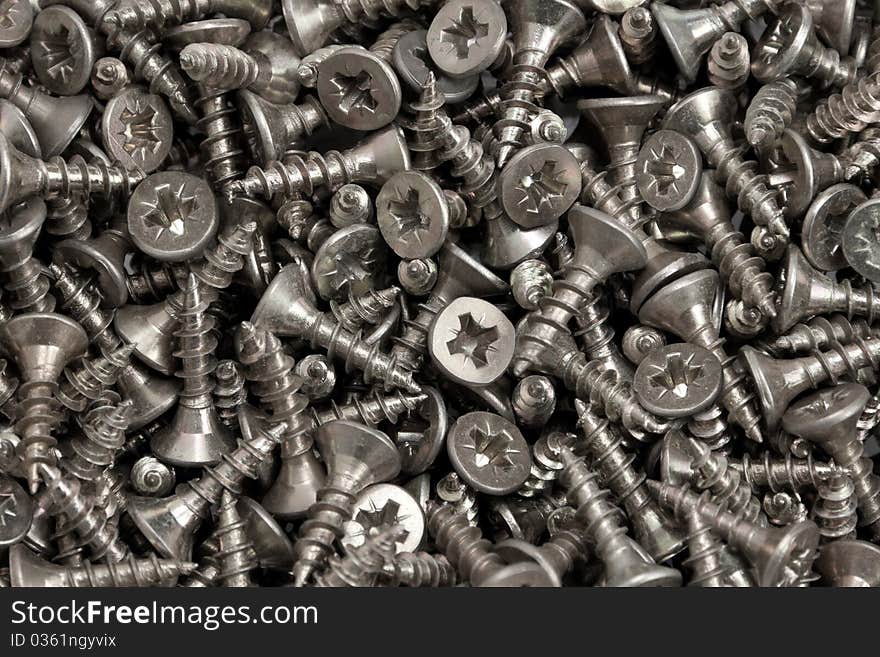 Background from set of metallic screws. Background from set of metallic screws