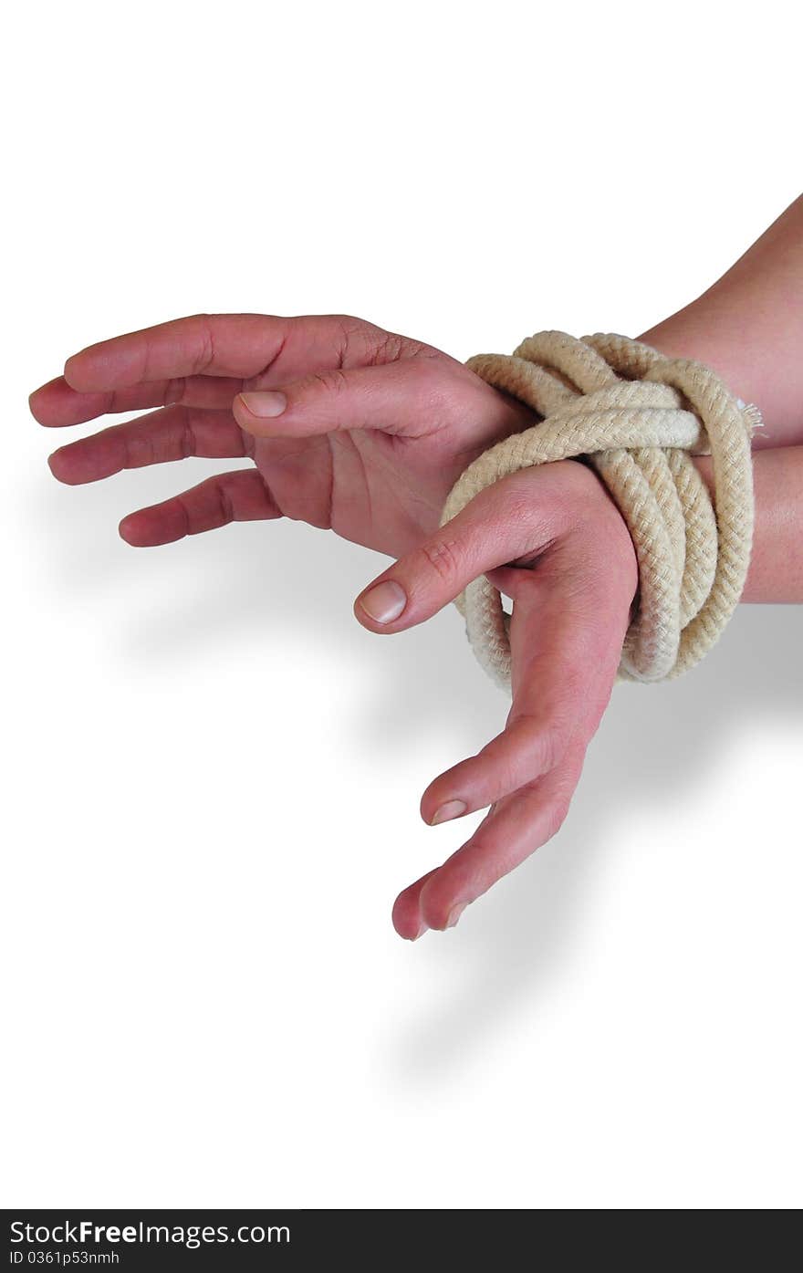 It photographs of two woman hands tied with a rope. It photographs of two woman hands tied with a rope