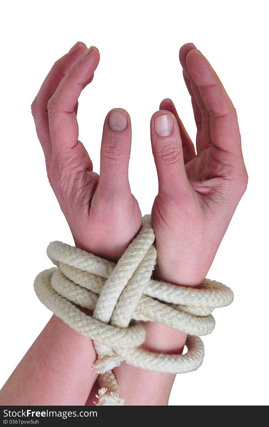 It photographs of two woman hands tied with a rope. It photographs of two woman hands tied with a rope