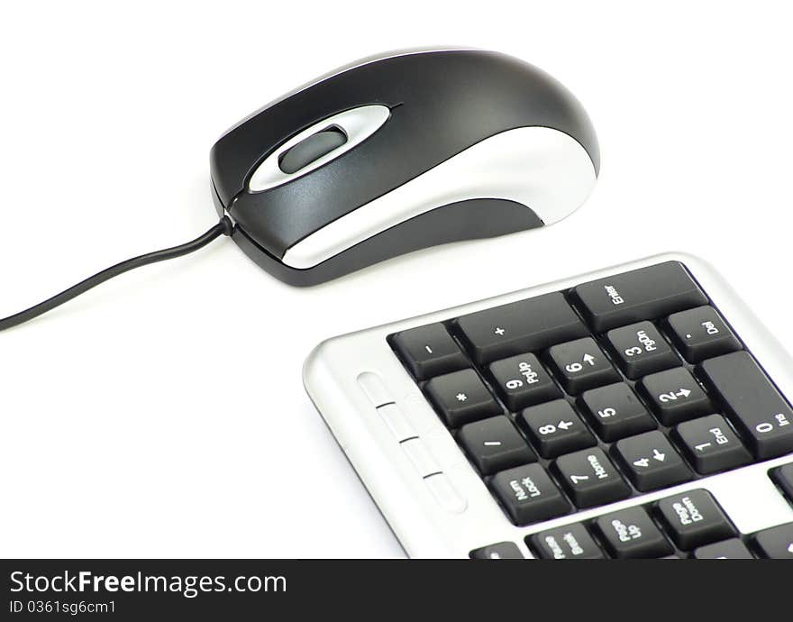 Computer mouse and keyboard isolated on white