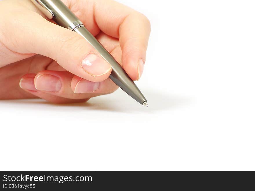 Hand holding pen isolated on white background