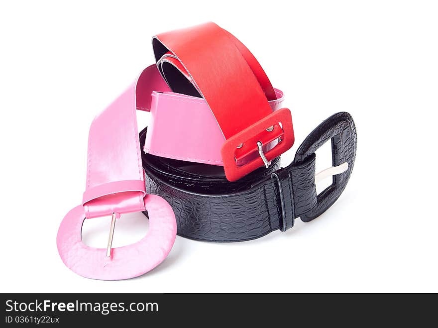 Three women belt on a white background