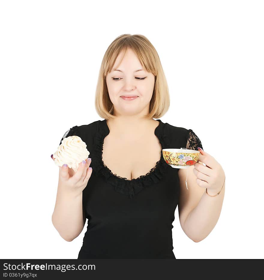 Beautiful young girl who holds in one hand a sponge cake