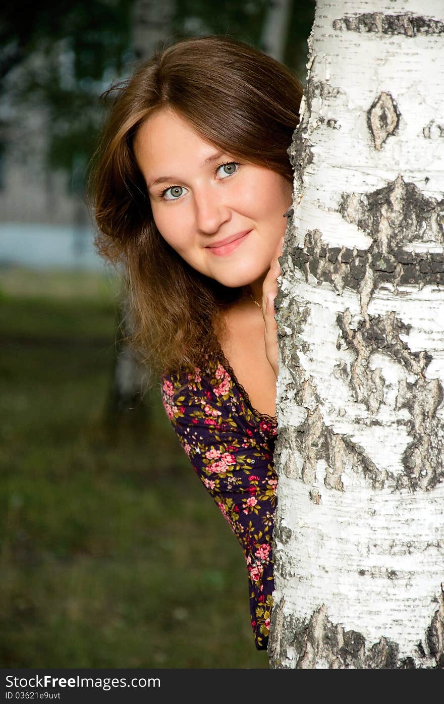 Portrait of pretty smiling looking out of woman. Portrait of pretty smiling looking out of woman