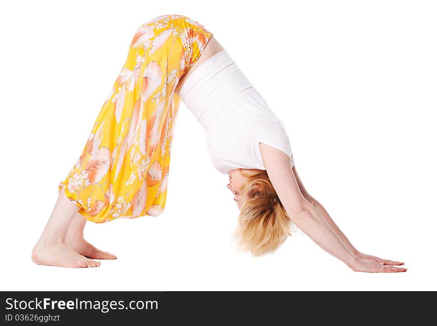 Young woman doing yoga exercise. isolated