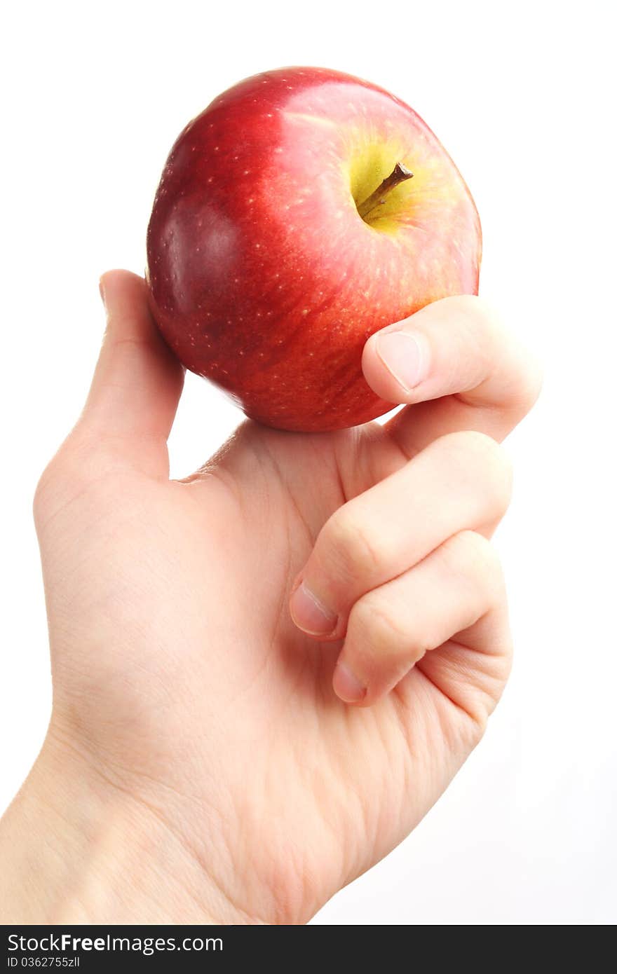 Hande hold red apple. Isolated on white background. Hande hold red apple. Isolated on white background