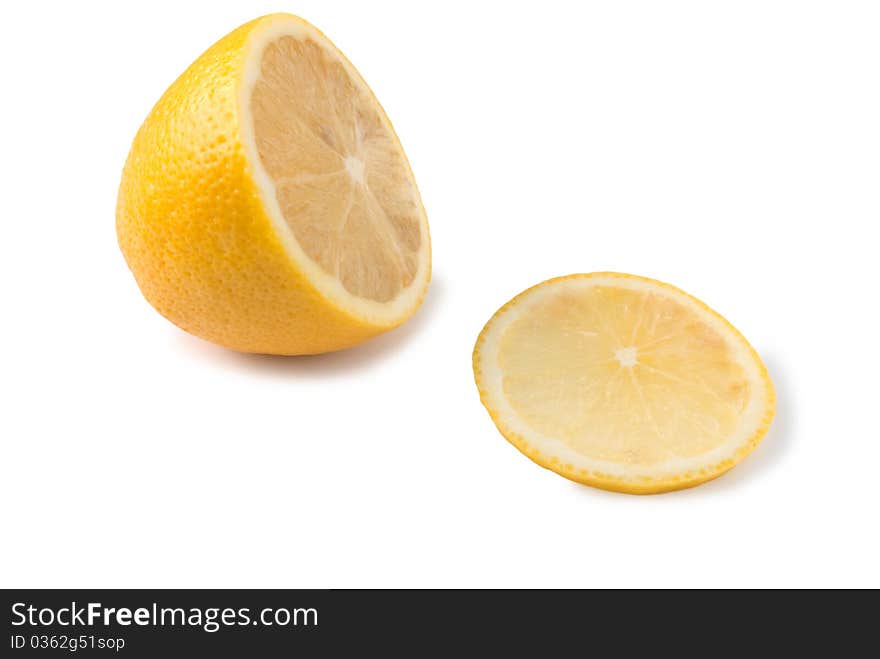 Cut lemon on a white background