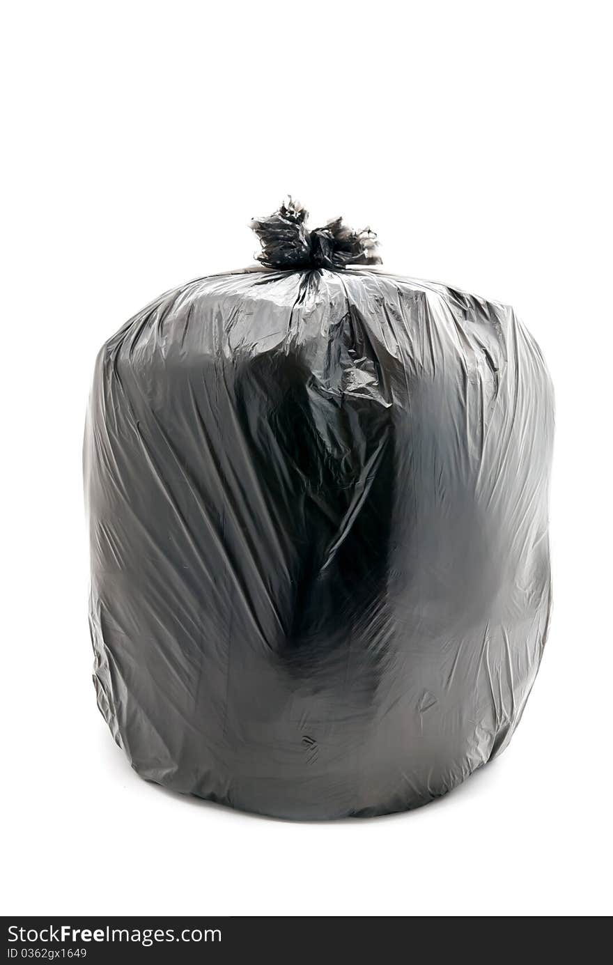 Tied garbage bag isolated on a white background. Tied garbage bag isolated on a white background.