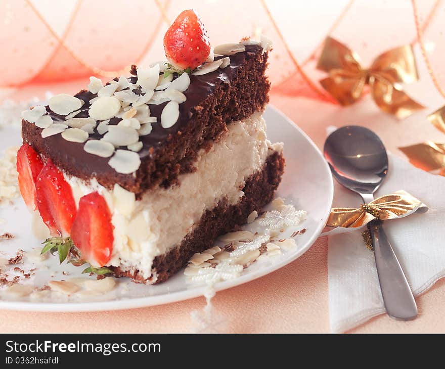 Strawberry cake with black chocolate biscuit