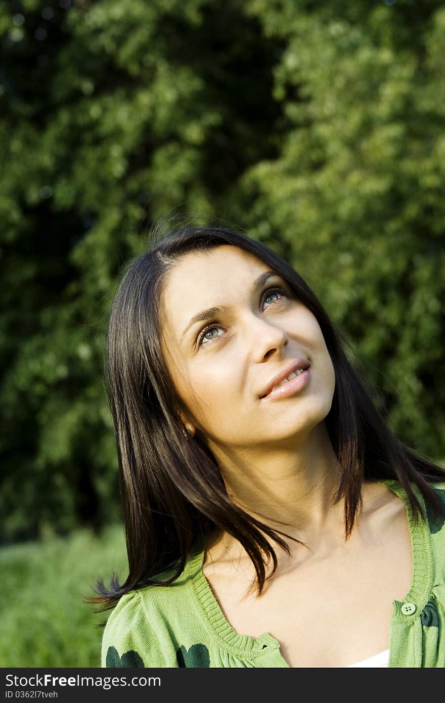 Beautiful young woman outdoors in nature. Portrait. Beautiful young woman outdoors in nature. Portrait