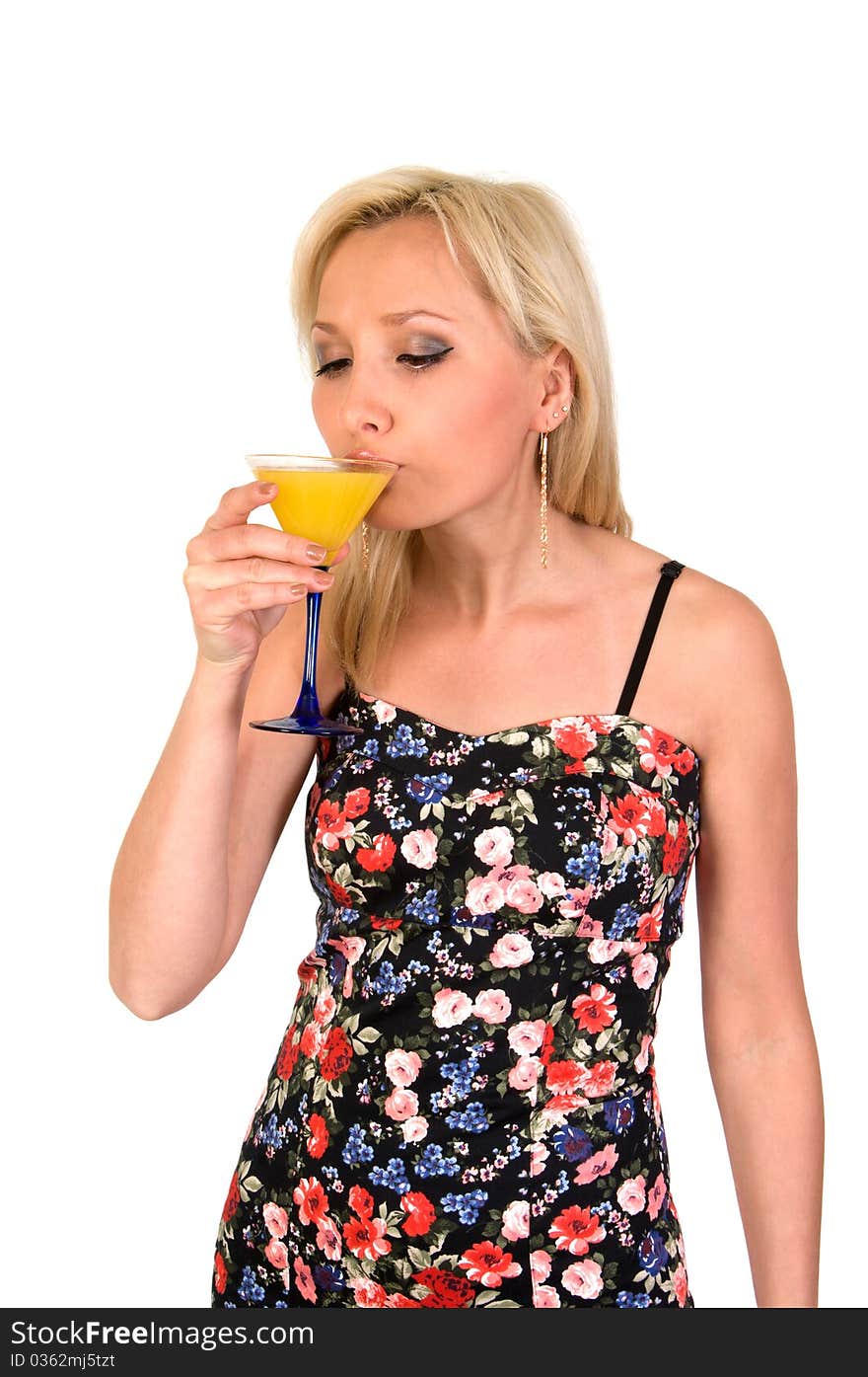 Girl drinks cocktail from glass isolated on white background. Girl drinks cocktail from glass isolated on white background.