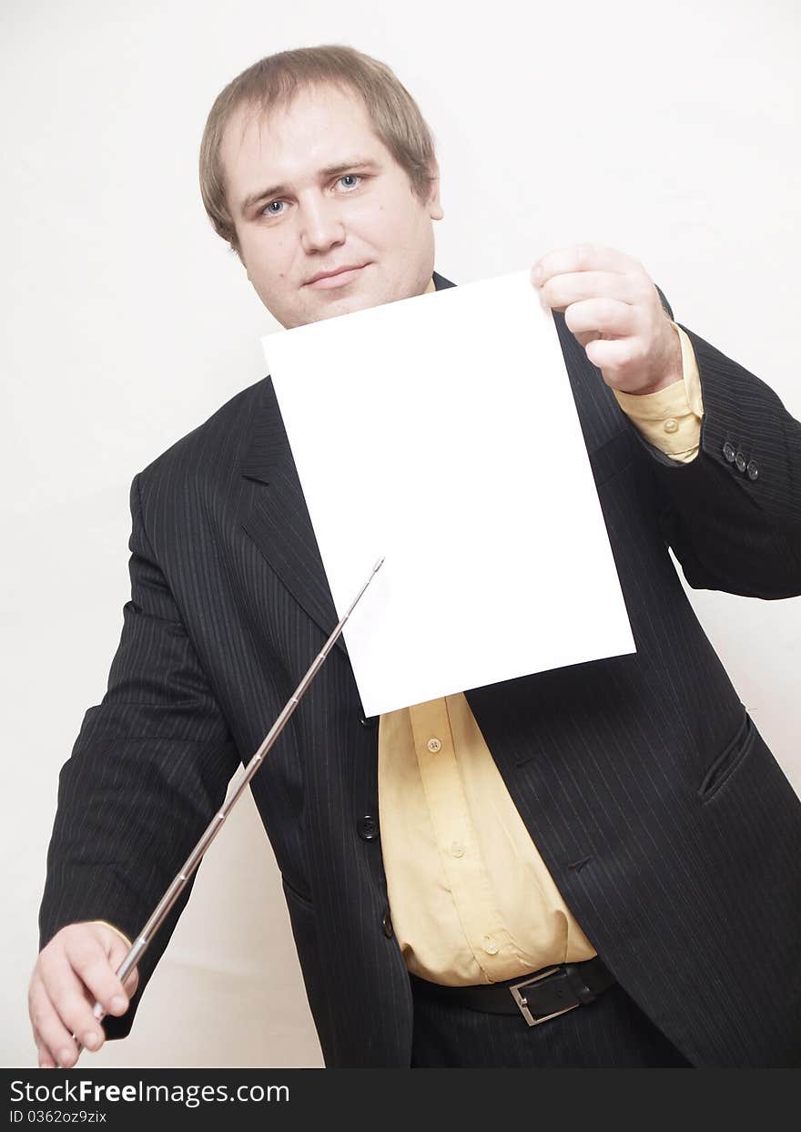 ManThe businessman of average years costs on a white background