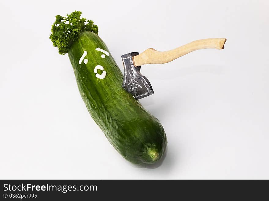 Cucumber with face and ax