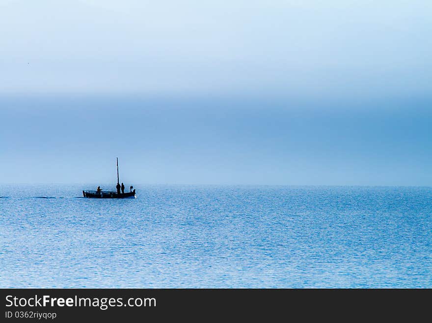 Silhouette of the fishing boat in the morning. Silhouette of the fishing boat in the morning