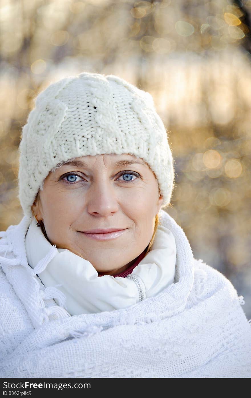 Portrait Of Woman In A Winter Background