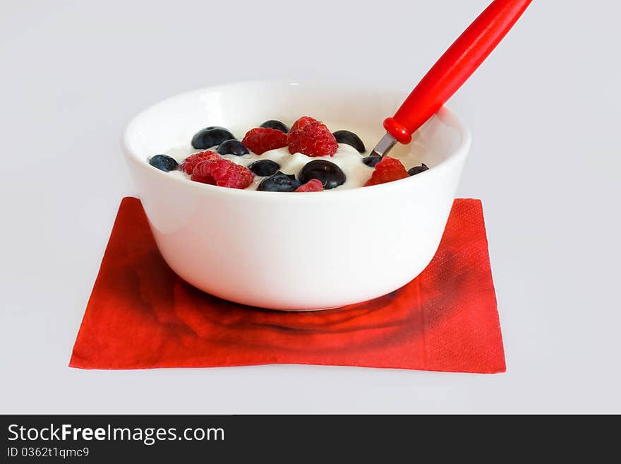 Bowl with berries on a red napkin