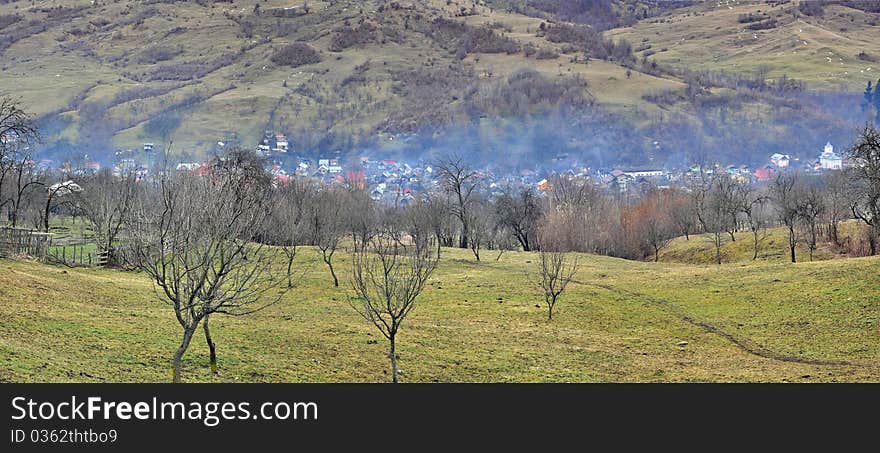 Fog on hills in a winter day