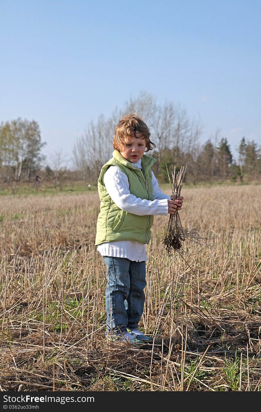 Little girl stand on the field, 2010