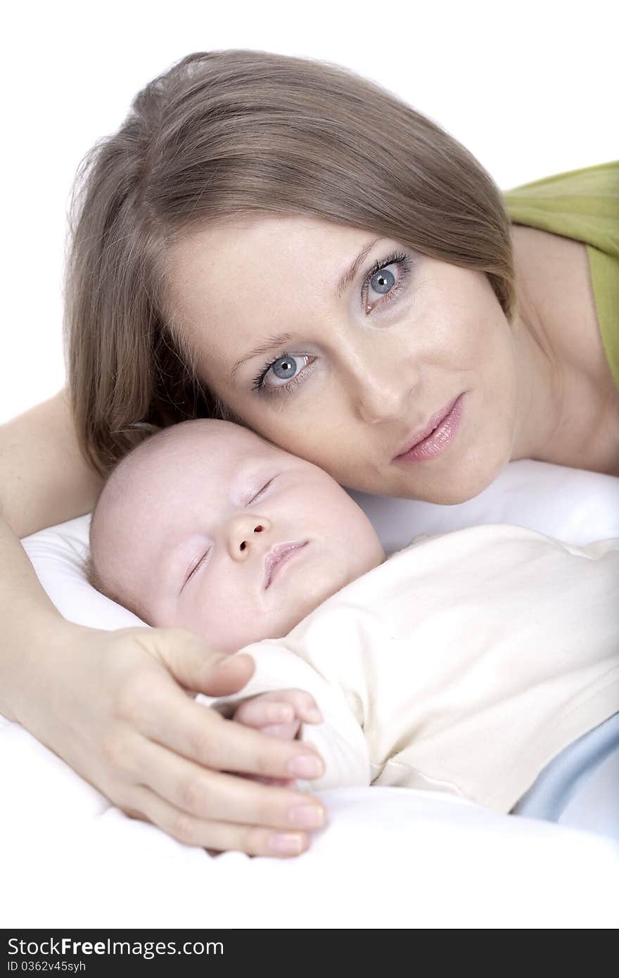 Mother and her sleeping baby. Mother and her sleeping baby