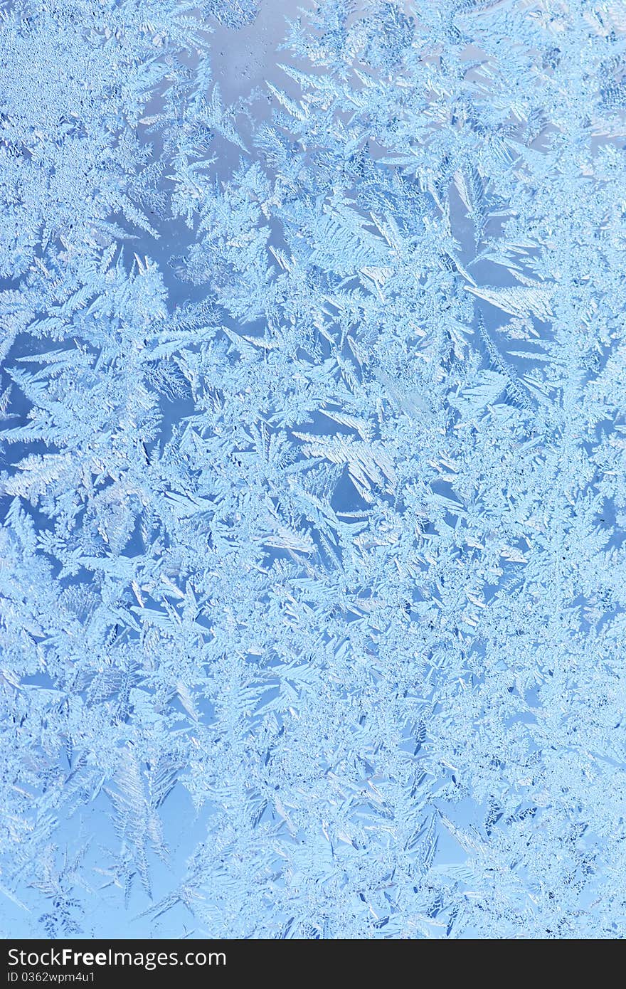 Wintry hoarfrost background on a window. Wintry hoarfrost background on a window