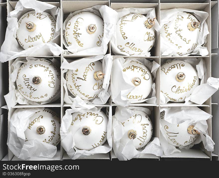 White Christmas balls in box. White Christmas balls in box