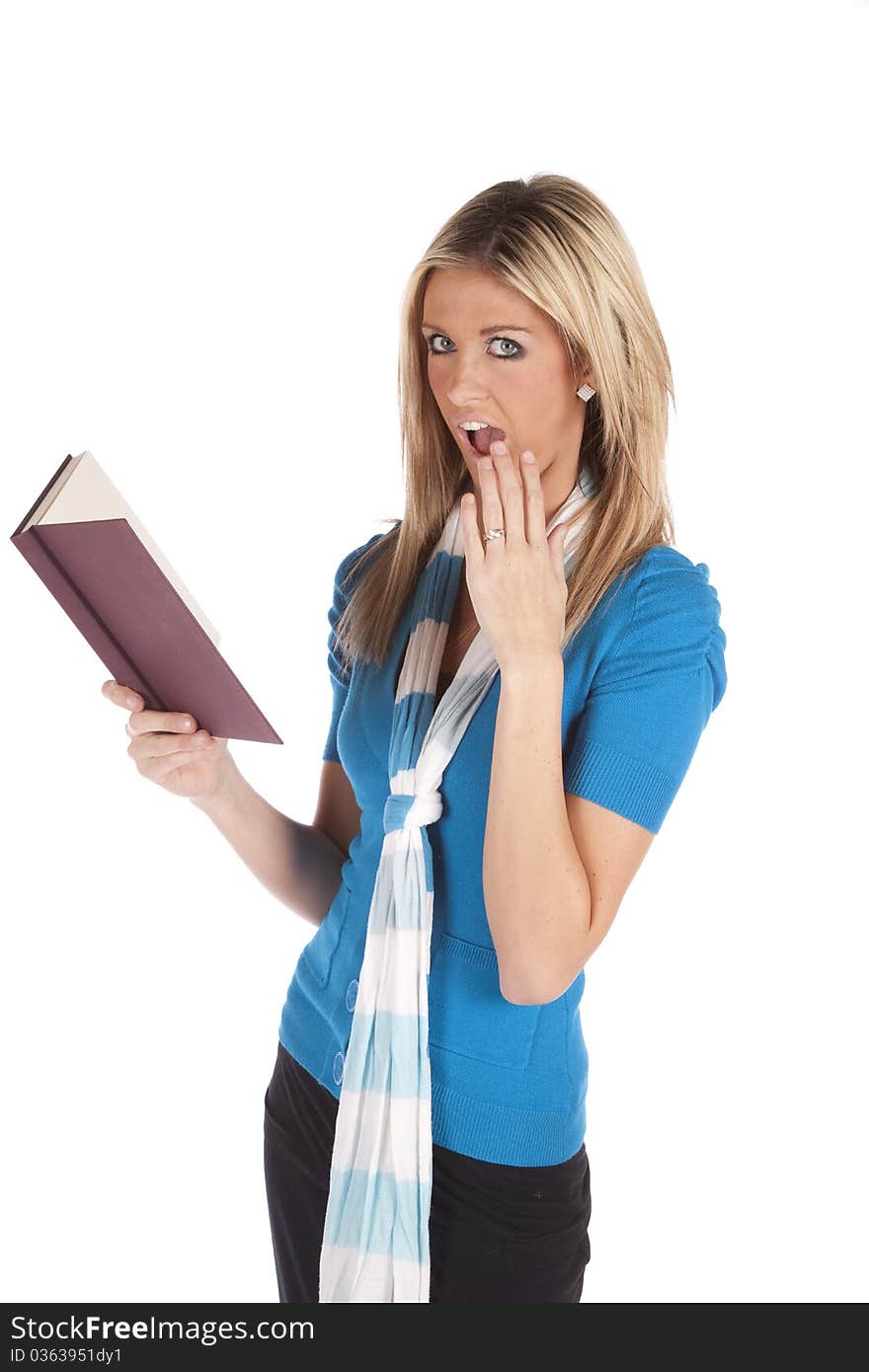 A woman is standing with a book. A woman is standing with a book.