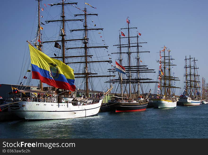 Tall sailing boats tied up for a race. Tall sailing boats tied up for a race