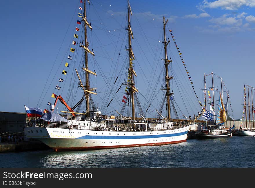 Tall sailing boats tied up for a race. Tall sailing boats tied up for a race