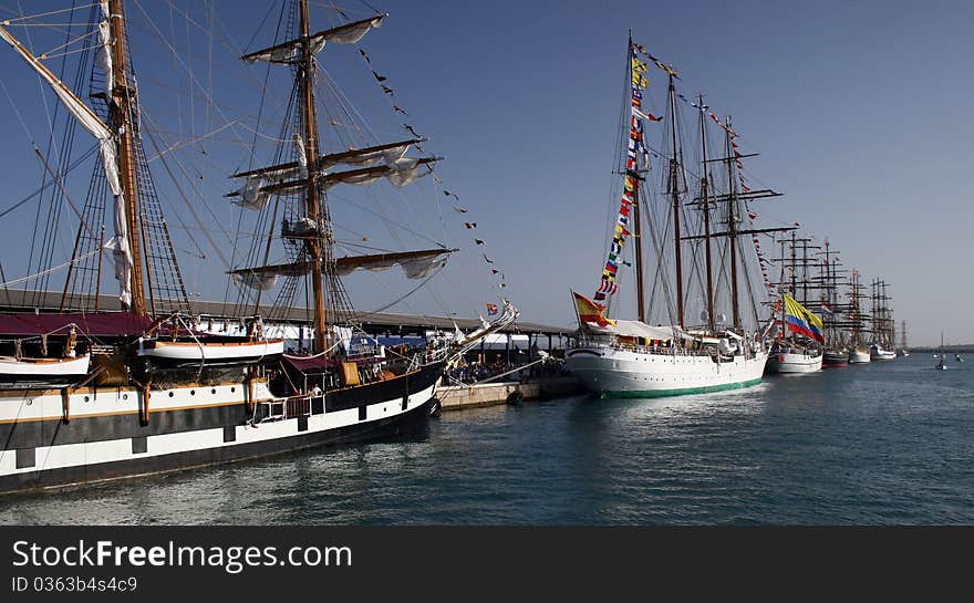 Tall sailing boats tied up for a race. Tall sailing boats tied up for a race