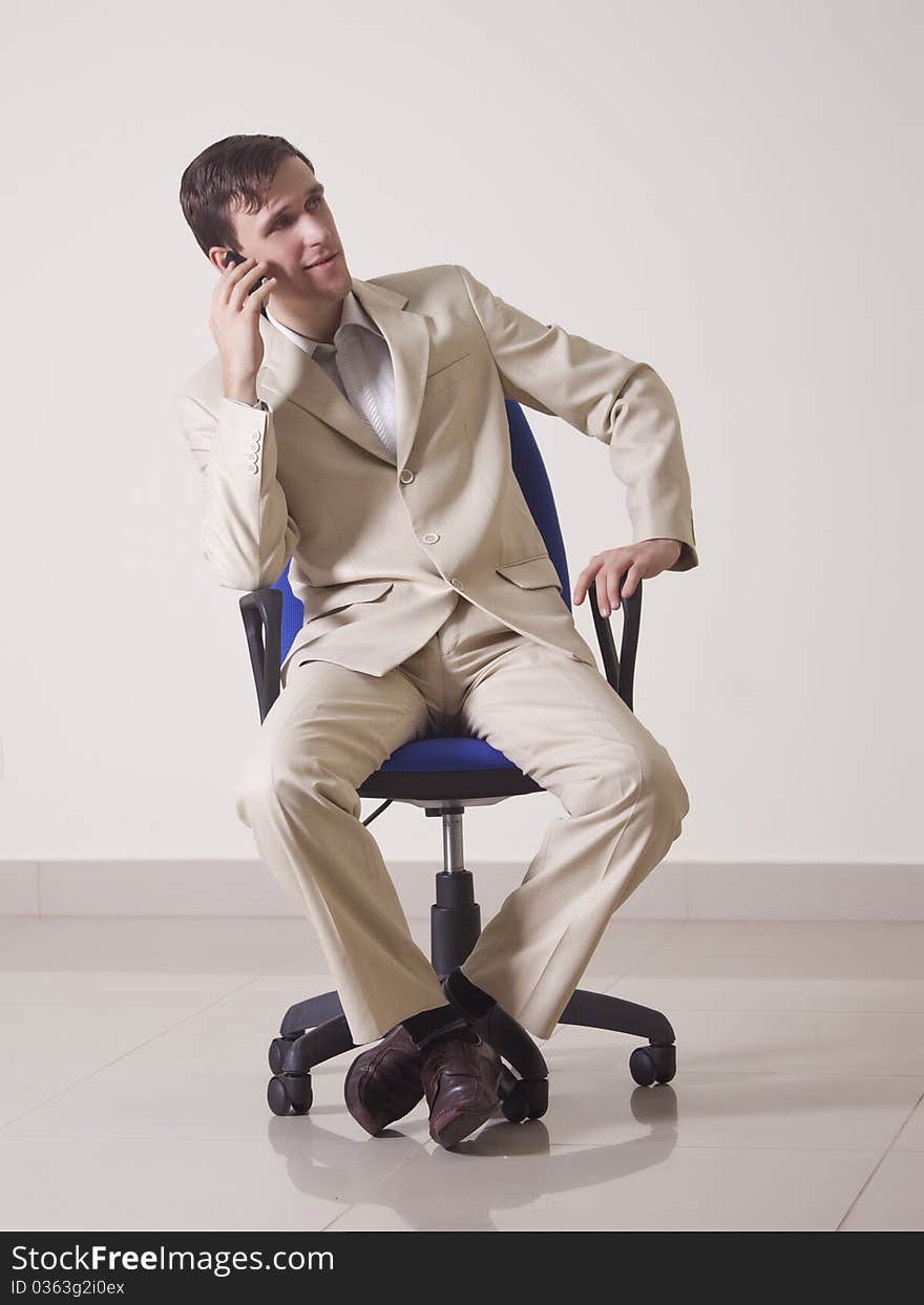 A young man talking on the phone