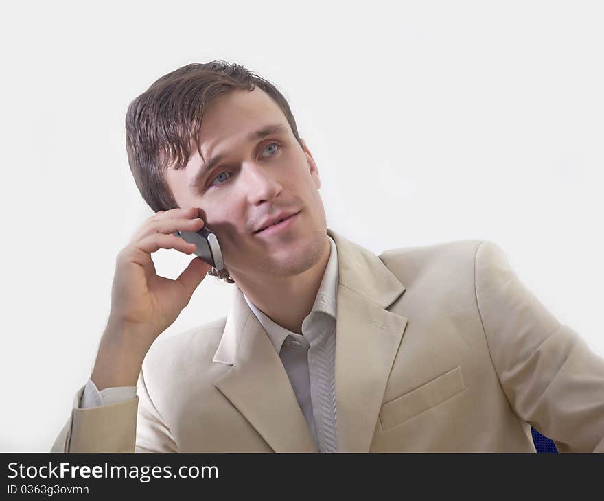 A young man talking on the phone