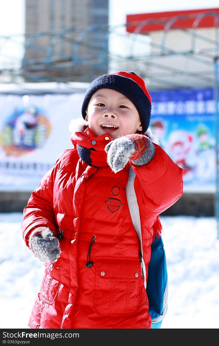 Asian Boy Is Playing Snow