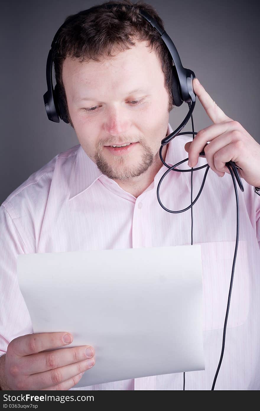 Smiling male customer service operator in headset