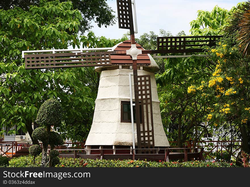 Windmill surrounded by plants