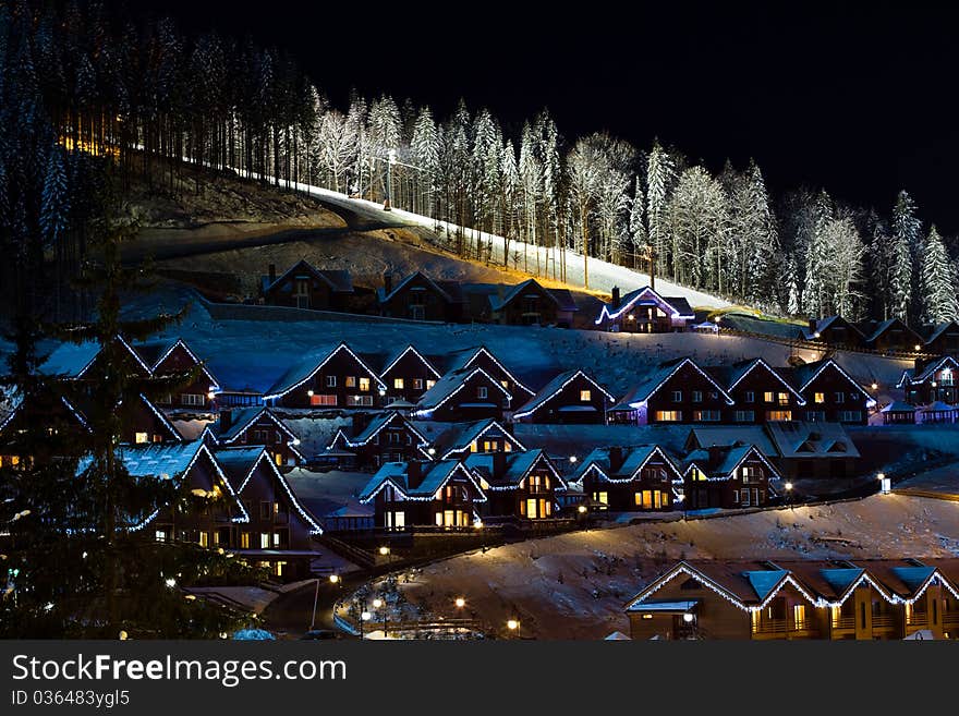 Winter Snow Covered Houses In The Mountains.