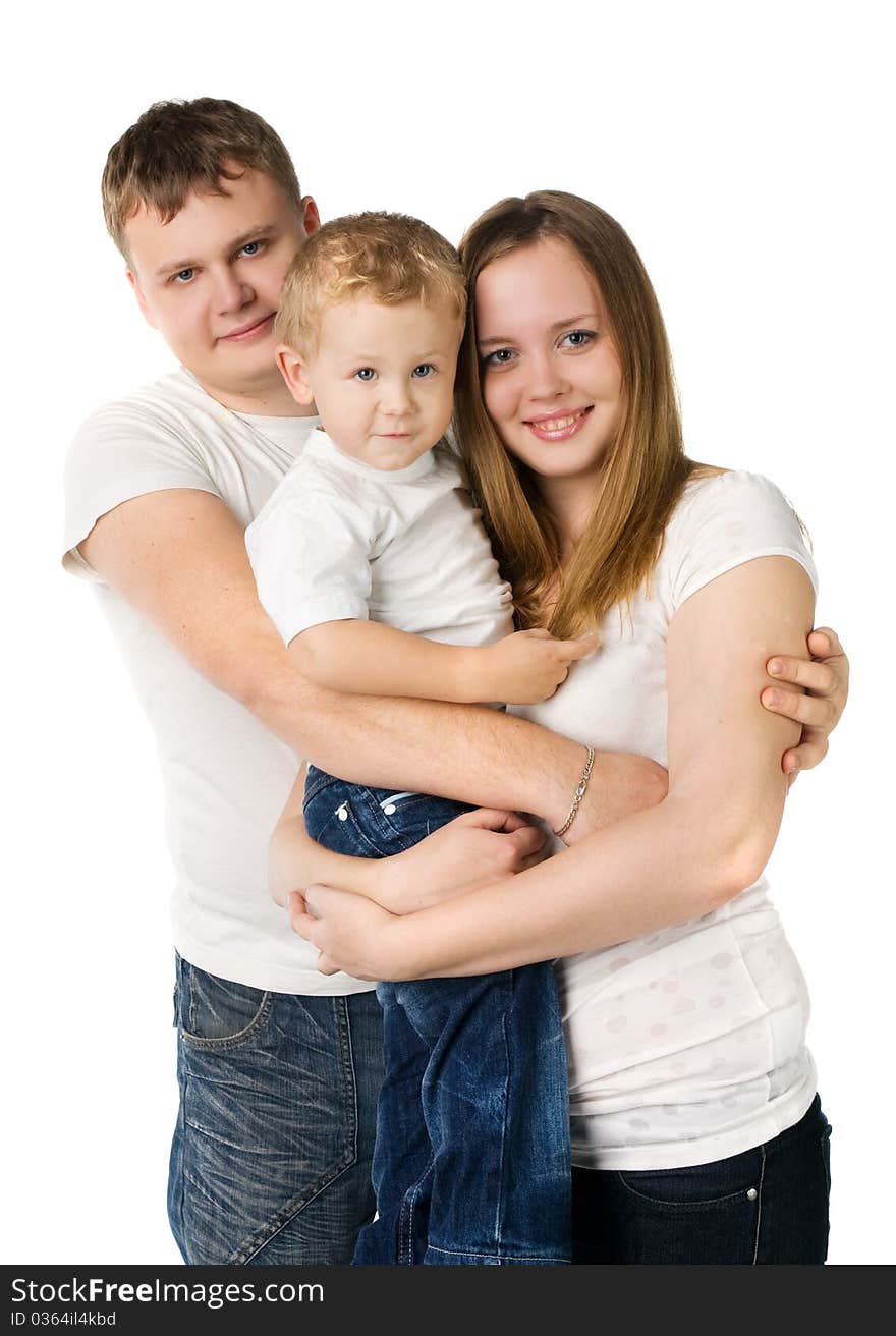 Family from three persons in white T-shirts with the child on hands, isolated on white. Family from three persons in white T-shirts with the child on hands, isolated on white