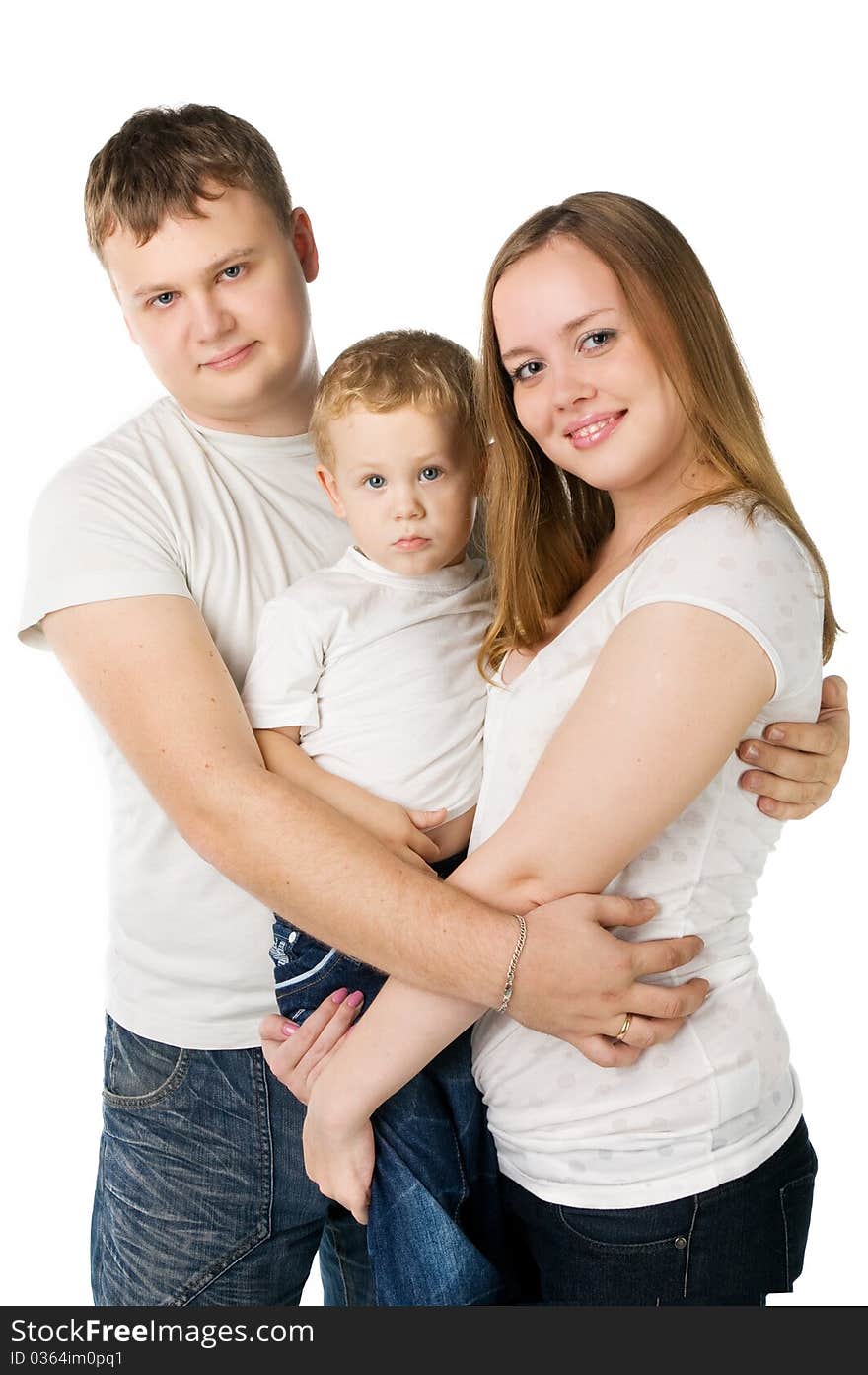 Family from three persons in white T-shirts with the child on hands, isolated on white. Family from three persons in white T-shirts with the child on hands, isolated on white