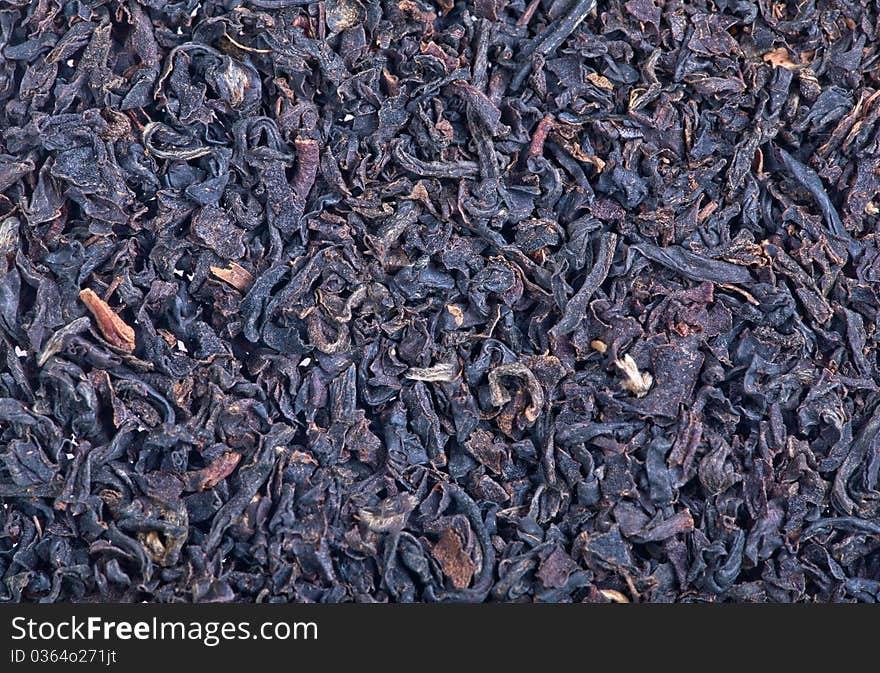 Macro of black tea leaves background