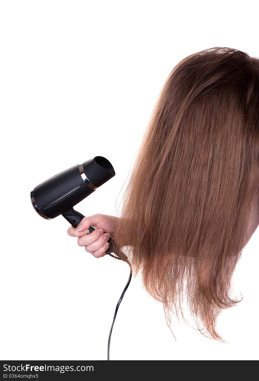 Woman hair and dryer on white