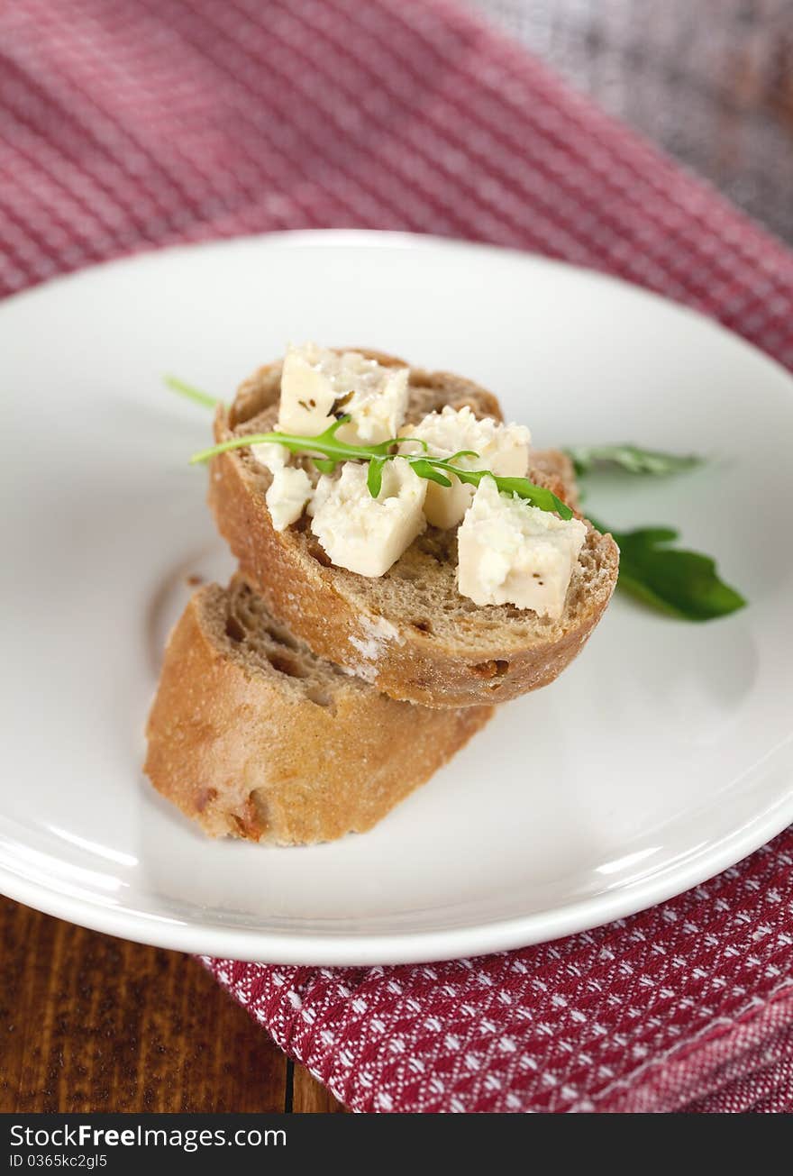 Baguette bread with feta cheese for appetizer. Baguette bread with feta cheese for appetizer