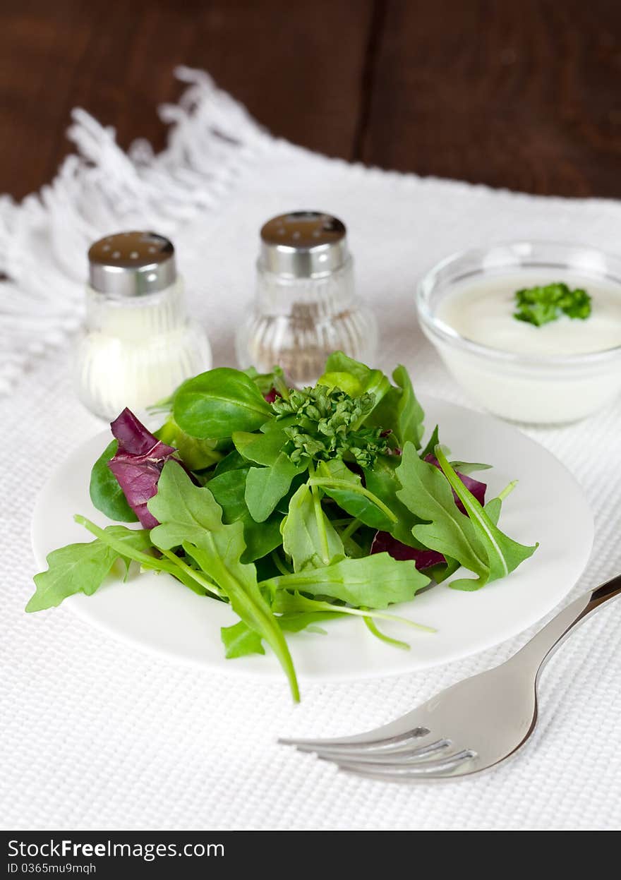 Salad with dressin salt and pepper