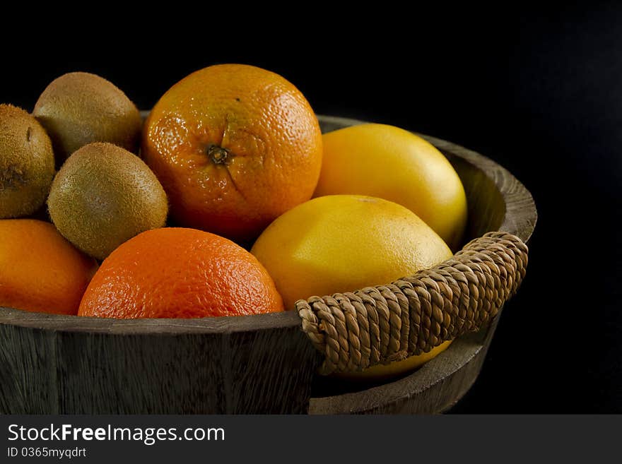 Tropical fruits on a black background